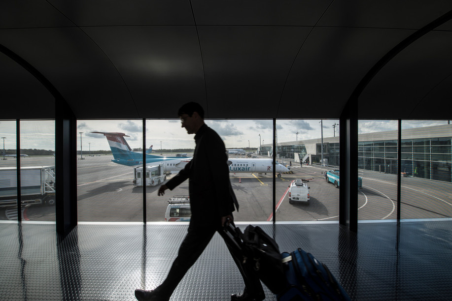 A Luxair plane can be seen from the terminal of Luxembourg’s airport in Findel Photo: Anthony Dehez