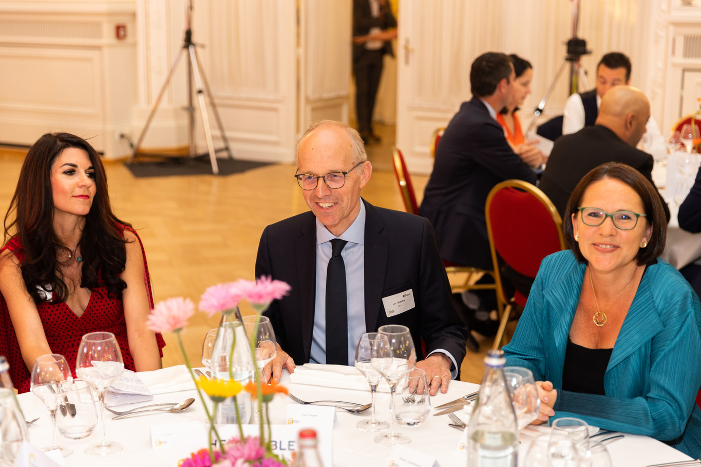 Lize-Mari Barnes (Swiss Re), Luc Frieden (CSV), Yuriko Backes (DP) at a gala dinner to launch EY Luxembourg's 2023 attractiveness survey, held at the Cercle Cité on 15 June. Photo: Romain Gamba/Maison Moderne