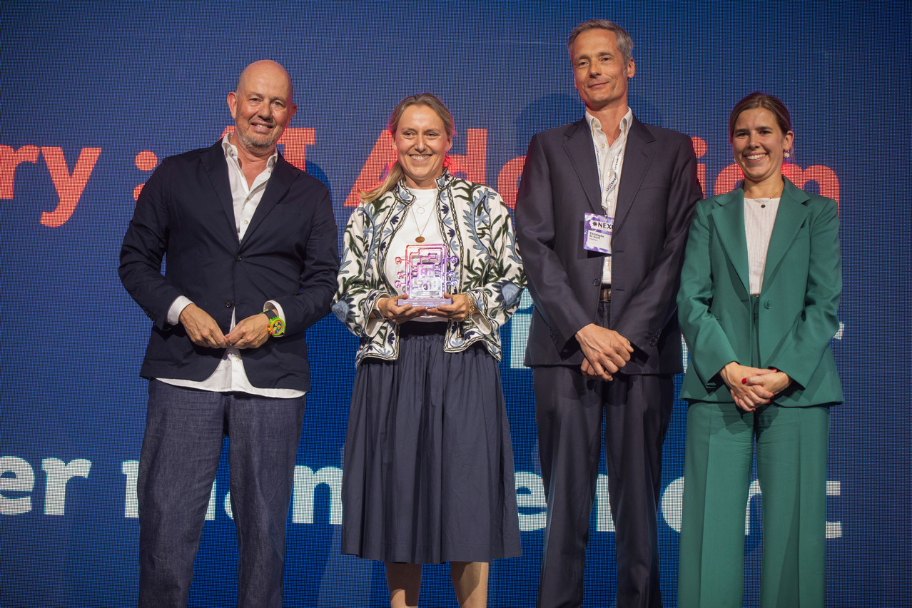 Jean-Louis Schiltz, Christophe De Greift and Elisabeth Margue flank Carole Fischer, whose company was one of the first to win a Luxembourg AI Excellence Award last year. (Photo: Nexus Luxembourg)