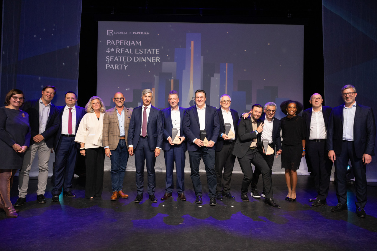 The winners and members of the jury of the LuxReal x Paperjam Club Real Estate Awards 2024 on stage at Casino 2000, 2 October 2024. Photo: Eva Krins/Maison Moderne