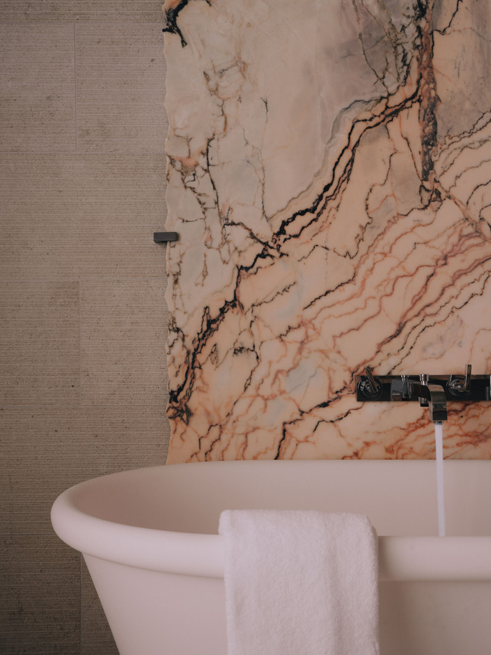 Marble is one of the hotel’s flagship materials, along with leather, wood and waxed concrete. Photo: Julius Hirtzberger