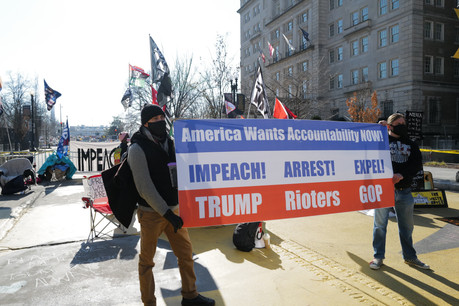 À une semaine de la prestation de serment de Joe Biden, la tension monte dans les rues de Washington, où les supporters et opposants de Donald Trump manifestent, tandis que les commerces se barricadent dans la crainte de violences. (Photo: Shutterstock)