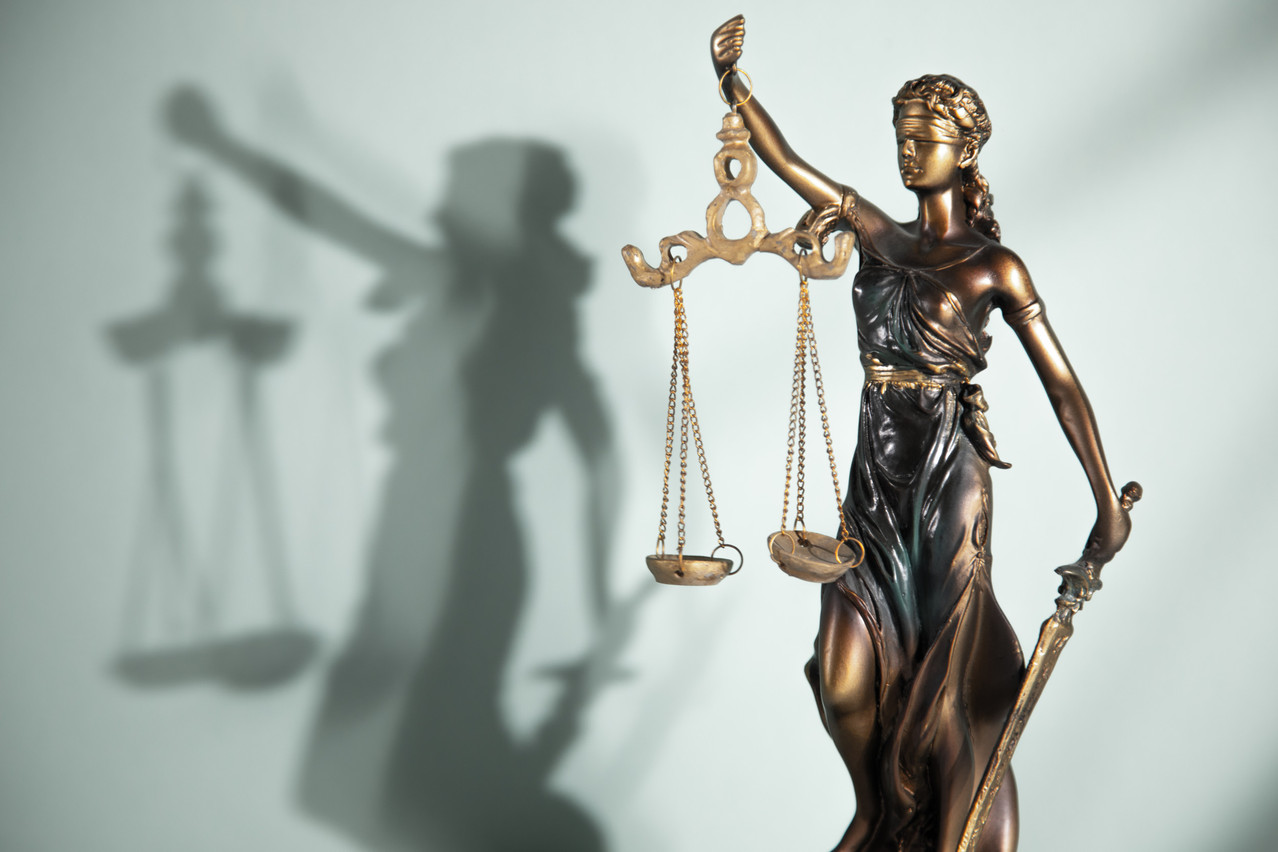 The Statue of Justice symbol, legal law concept image Copyright (c) 2021 Tiko Aramyan/Shutterstock.  No use without permission.