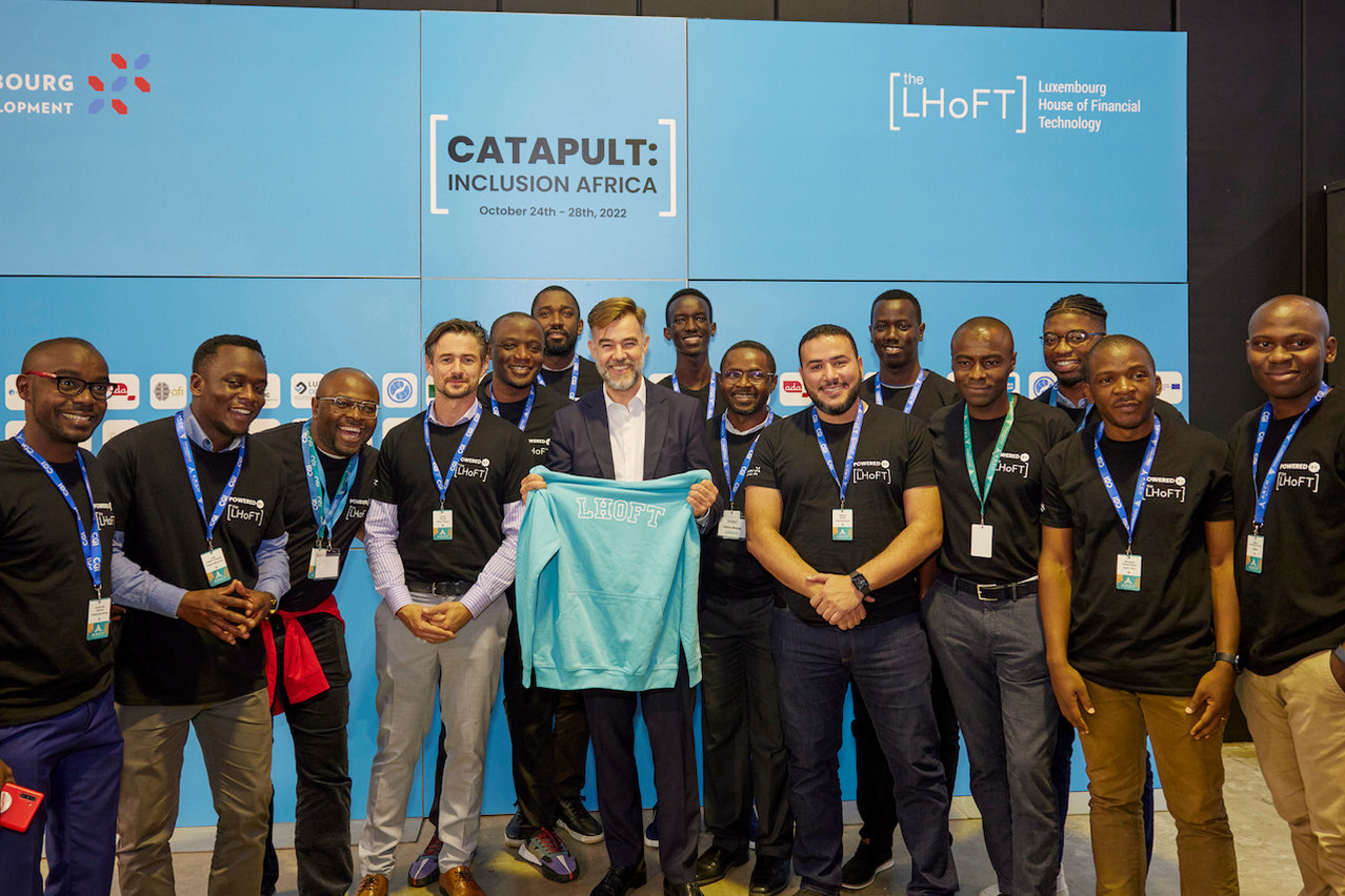 Franz Fayot, minister for development cooperation and humanitarian affairs, alongside Hello Tractor’s James Goode and representatives from the 15 participating fintechs at this year’s CATAPULT: Inclusion Africa programme.  ericdevillet.com