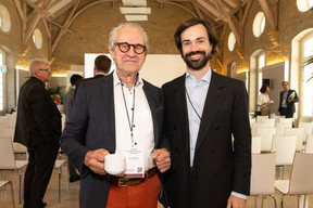 Denis Fellens at Interlycées and Luca Bagiotti at Fundrock LIS, seen during Luxflag Sustainable Investment Week, 22 October 2024. Photo: Eva Krins/Maison Moderne
