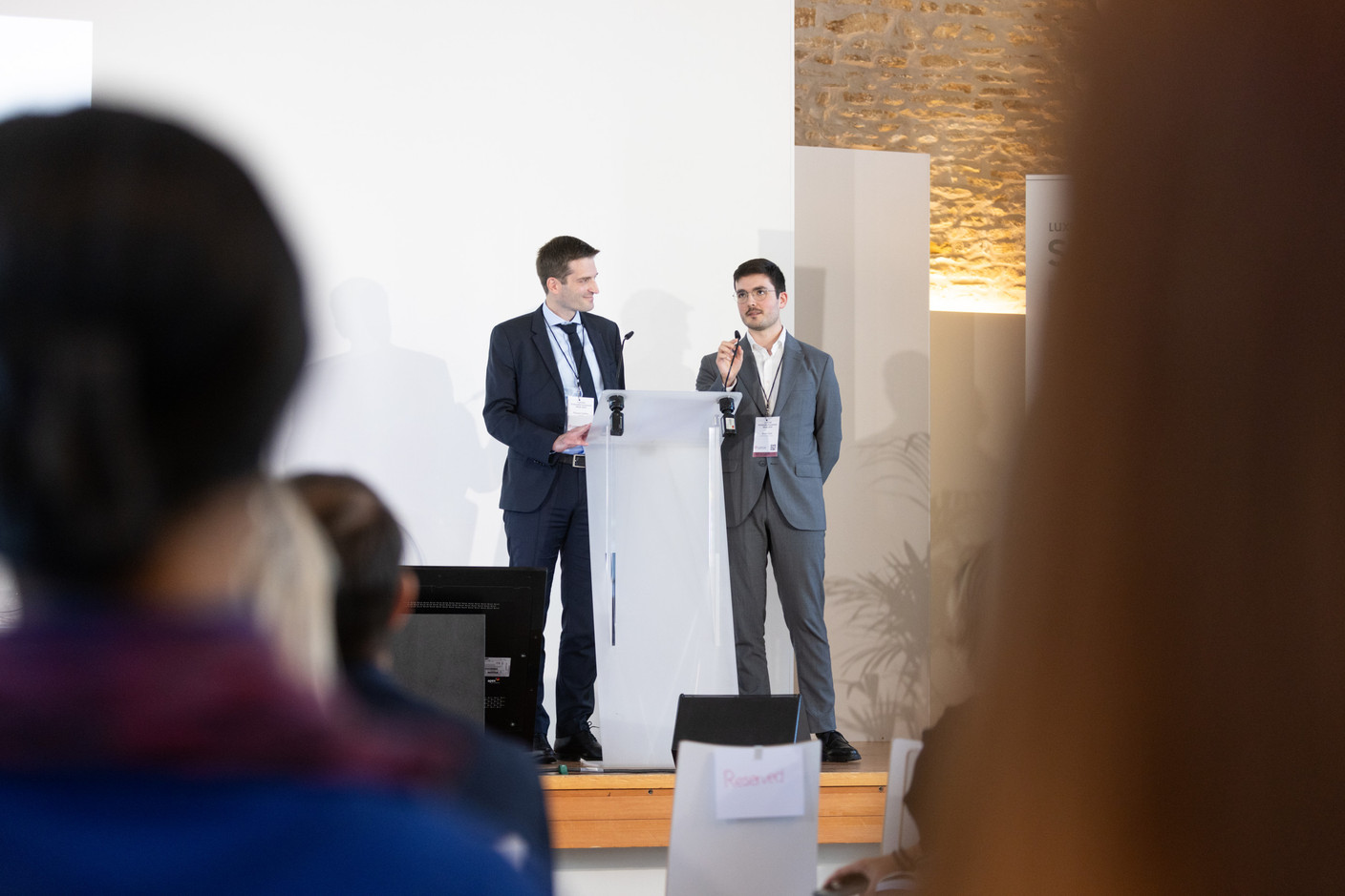 Florent Griffon, senior responsible investment specialist at Degroof Petercam Asset Management, and Aidan Geel, a doctoral researcher at the University of Liège, speak on “Understanding the Paris alignment performance dynamics of countries in the search for impact” at Luxflag Sustainable Investment Week, 22 October 2024. Photo: Eva Krins/Maison Moderne