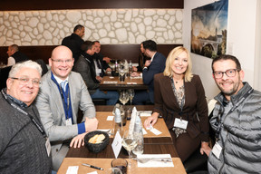 Christian Michel (Visua.lu), Romain Viard (Pinsent Masons Luxembourg), Klaudia Majerus (Home-IN) and Christophe Fernandez (Petrymobil) at the carrousel lunch organised by the Paperjam+Delano Business Club on Friday 1 December 2023 at the Bivius restaurant. Photo: Marie Russillo / Maison Moderne