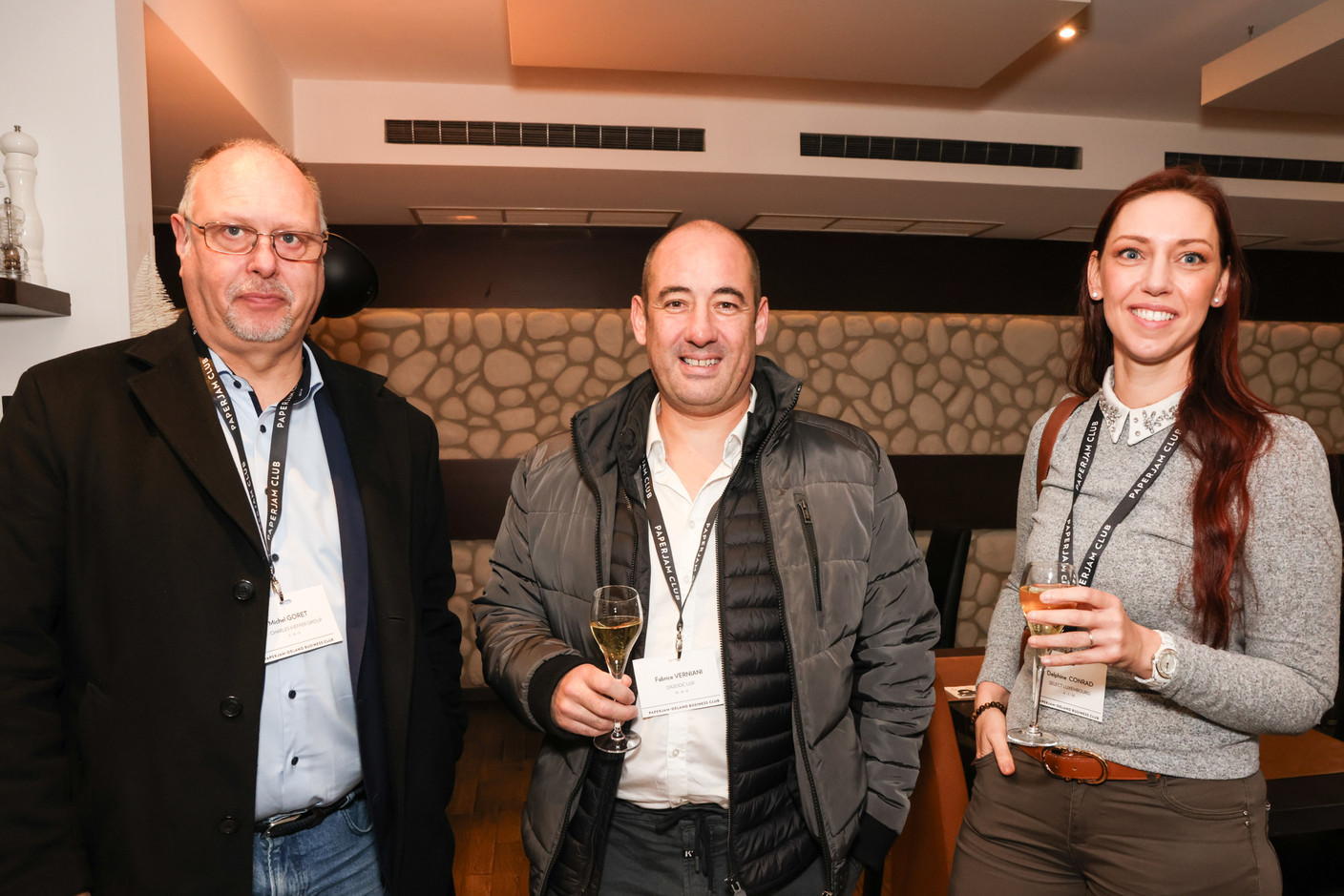 Michel Goret (Charles Kieffer Group), Fabrice Verniani (Digidoc Lux) and Delphine Conrad (Select Luxembourg) at the carrousel lunch organised by the Paperjam+Delano Business Club on Friday 1 December 2023 at the Bivius restaurant. Photo: Marie Russillo / Maison Moderne