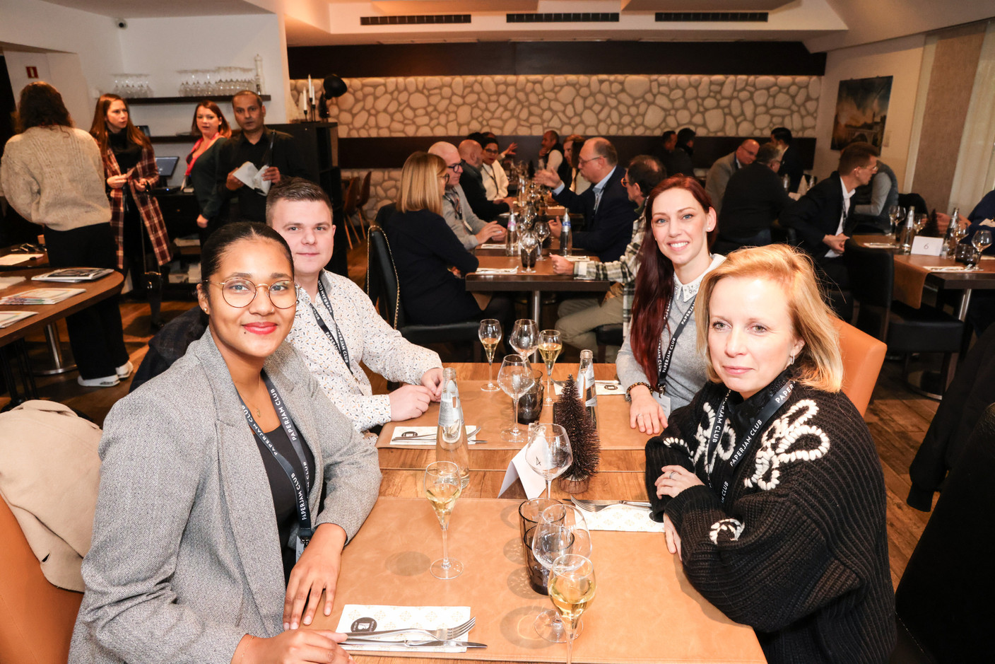 Océane Madelaine (Caceis), Yann Englebert (G-SYS Solutions), Delphine Conrad (Select Luxembourg) and Aurélia Feltz (Bee-Lex) at the carrousel lunch organised by the Paperjam+Delano Business Club on Friday 1 December 2023 at the Bivius restaurant. Photo: Marie Russillo / Maison Moderne