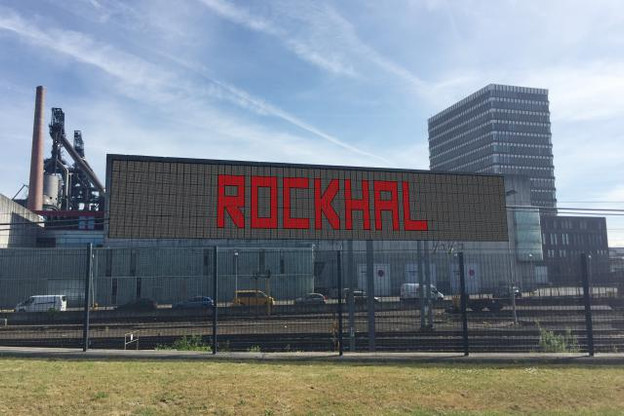 La façade sud de la Rockhal, située face à la gare d’Esch-Belval, sera aussi équipée de panneaux voltaïques, dont 80 rouges destinés à installer «une signalétique» sur le bâtiment. (Illustration: Fonds Belval)