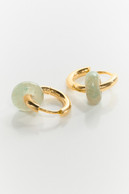 Photo showing one of the the brand’s best seller item, the two-way gemstone huggie hoop earrings.  Provided by Chen