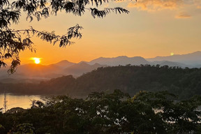 From Thailand to Laos and sunset over the Mekong river as seen from Phusi hill in Luang Prabang. Photos: Cordula Schnuer
