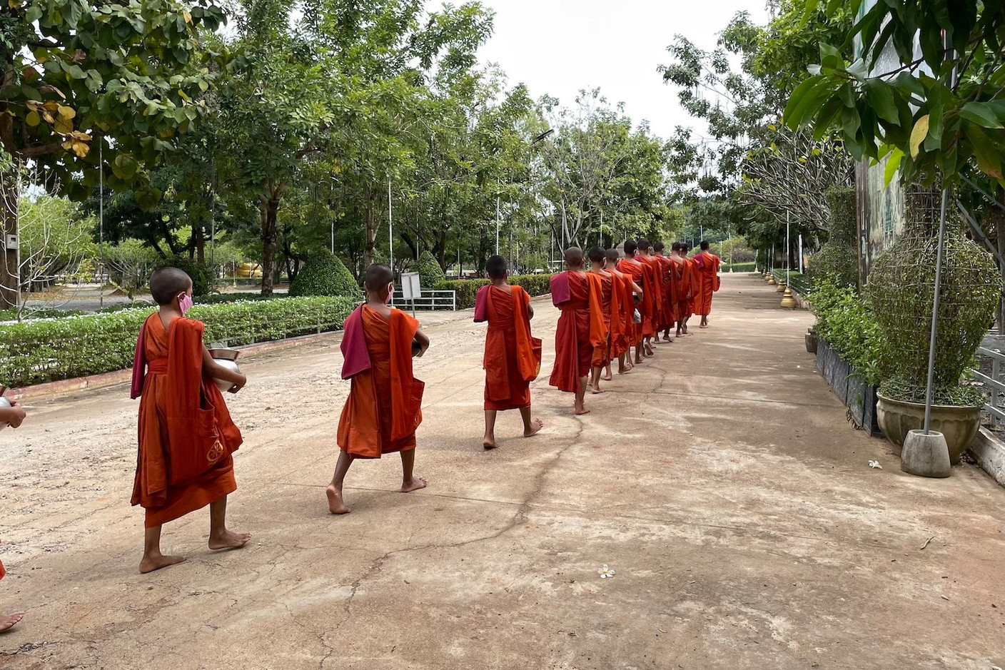 A procession of monks at Oudong heading out to collect donations. Photos: Cordula Schnuer