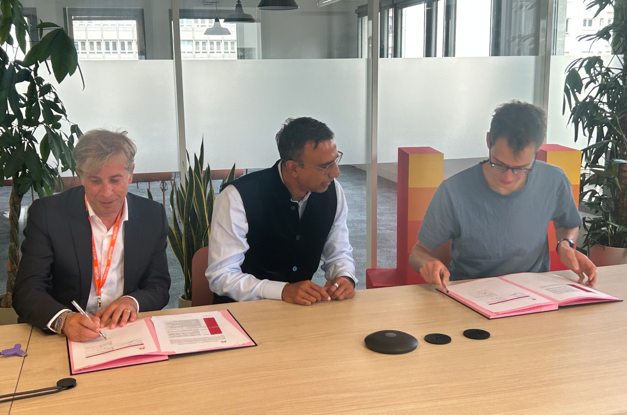 NTT Data Luxembourg CEO Olivier Posty, Abhijit Dubey, president and CEO of NTT Data, and Mistral AI CEO Arthur Mensch at the signing of this groundbreaking partnership, which puts the two partners on an equal footing. Photo: NTT Data