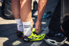 A rider makes sure his cycling shoes are in order Igor Sinitsin for PC3 Creative