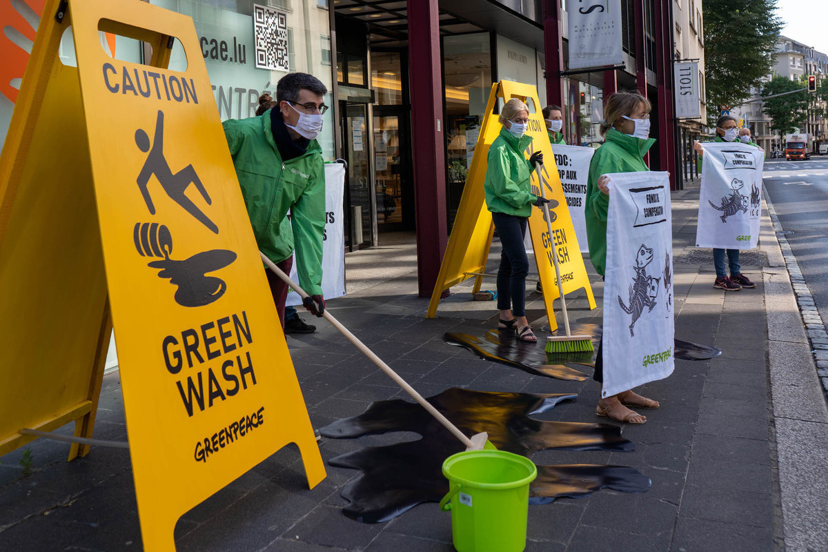 Activists pictured at a protest against the pension fund’s investments in 2020, one of many over the past years. Photo: Greenpeace