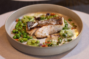 Cod, peas, beans and wild garlic gnocchi. Photo: Guy Wolff/Maison Moderne