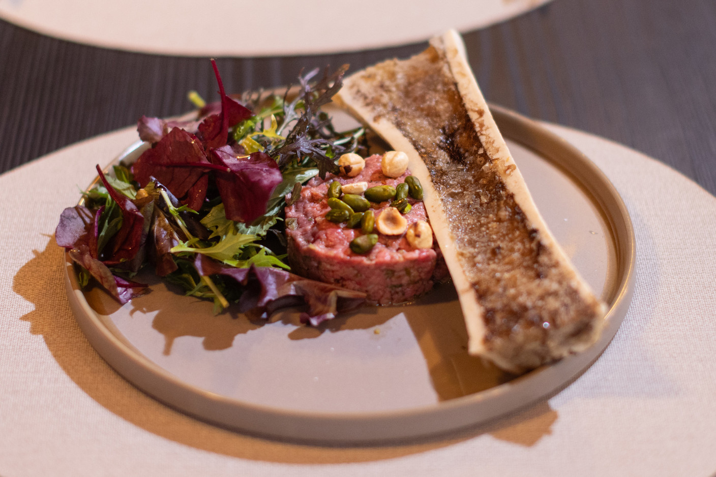 Beef tartare with marrow bone. Photo: Guy Wolff/Maison Moderne