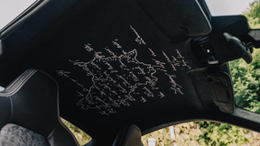 The first lines of the national anthem, written in Luxembourgish by Michel Lentz in 1859, as well as the outline of the country are embroidered on the Racetex roof lining. Photo: Porsche
