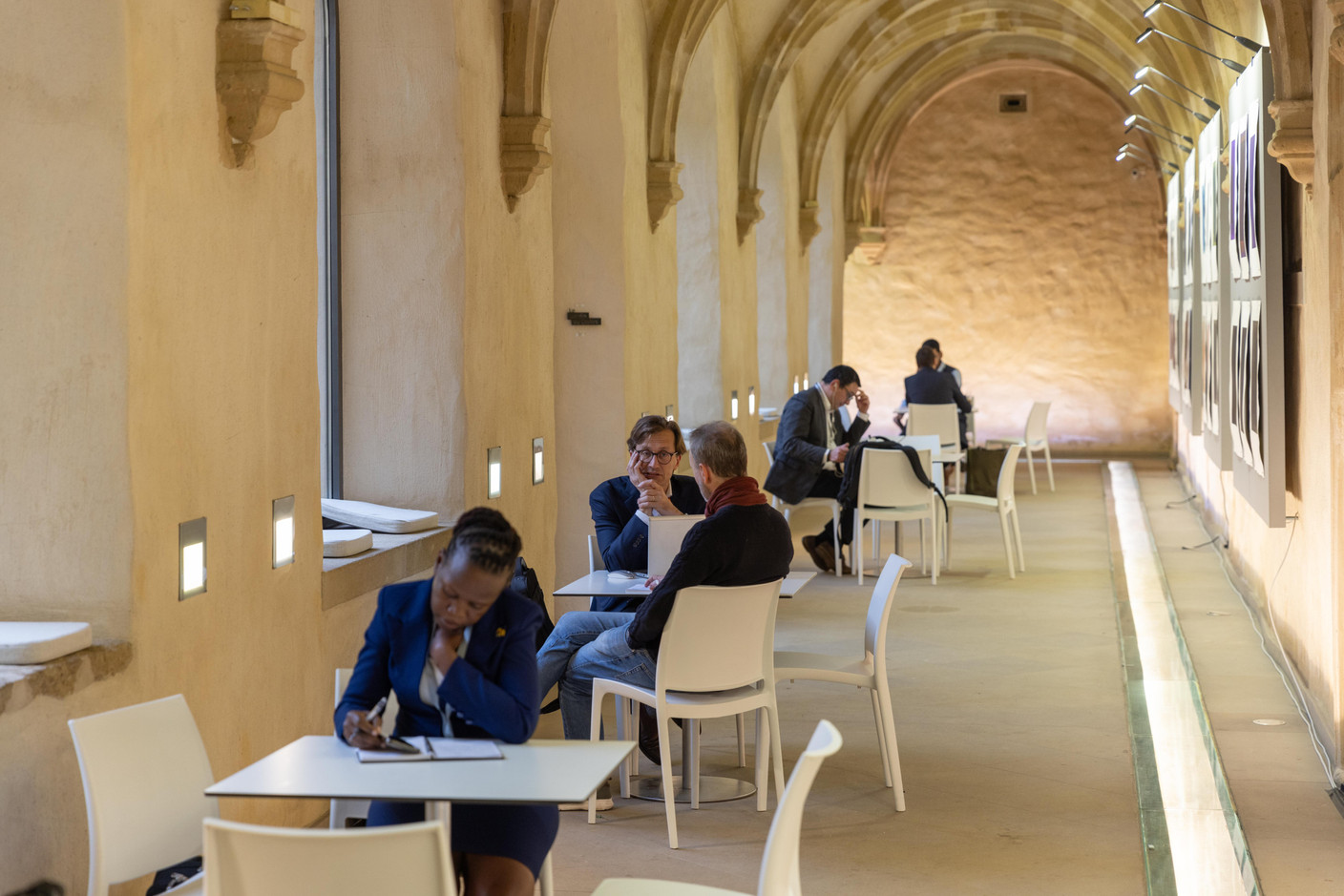 Participants during a networking event at Neumünster Abbey on the opening day of European Microfinance Week, 15 November. Photo: Romain Gamba / Maison Moderne