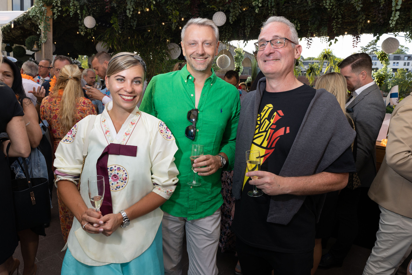Valeria Leone (East-West United Bank), Igor Leone (European Investment Bank) and Aaron Grunwald (Delano) seen during the Delano summer party, 13 July 2023. Photo: Guy Wolff/Maison Moderne