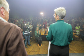 Sam Tanson, Green party lead candidate, on right, addresses supporters at the party’s election night HQ, held at Rotondes in Bonnevoie, 8 October 2023. Photo: Luc Deflorenne