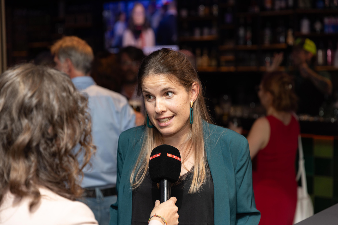 Alexandra Schoos, newly elected ADR MP for the East constituency, seen at the party’s election night HQ, 8 October 2023. Photo: Romain Gamba/Maison Moderne