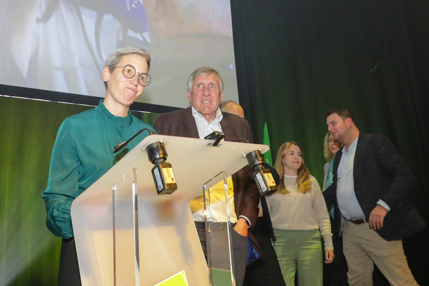 Sam Tanson, Green party lead candidate, on left, addresses supporters at the party’s election night HQ, held at Rotondes in Bonnevoie, 8 October 2023. Photo: Luc Deflorenne