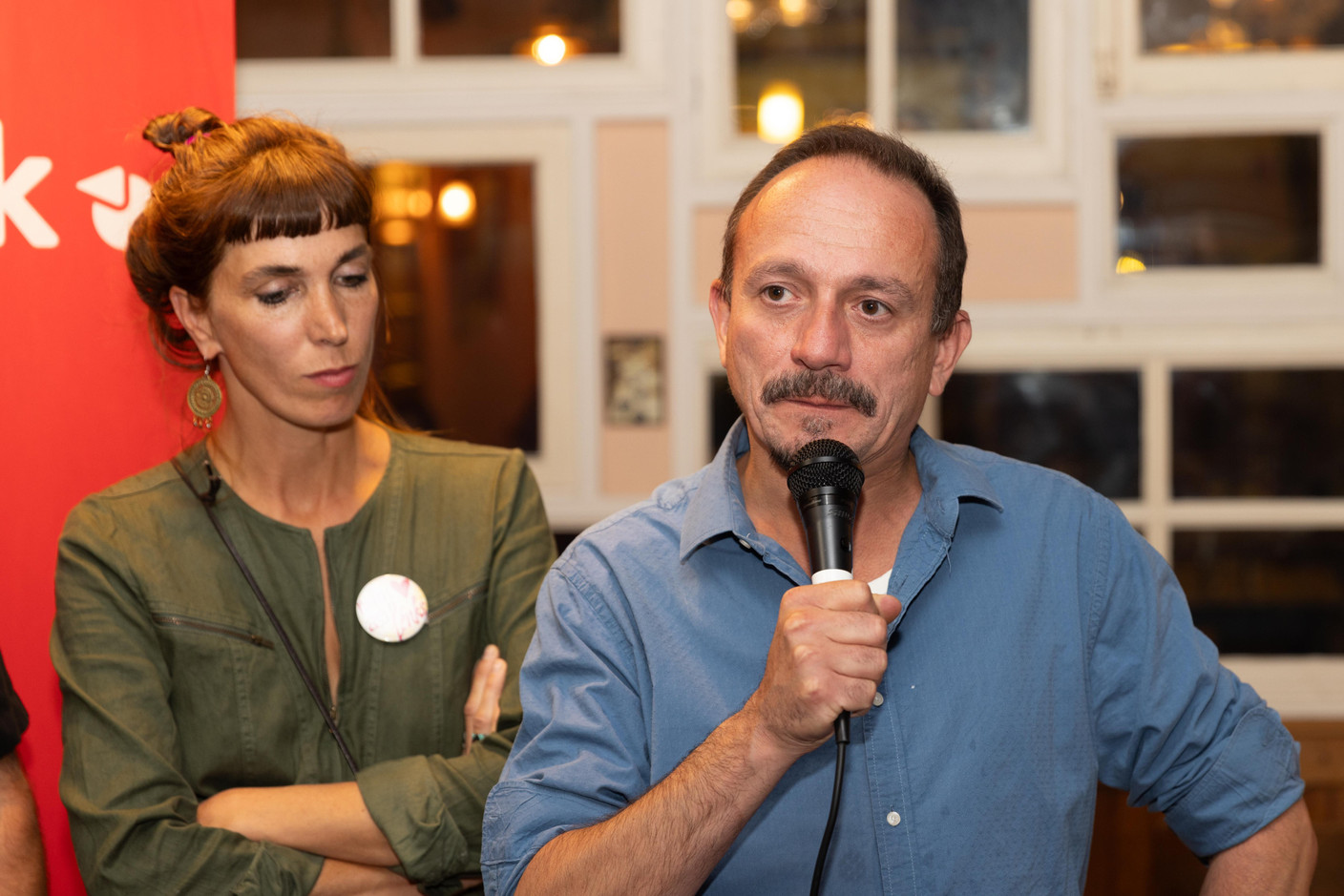 Outgoing MP Nathalie Oberweis and former MP Marc Baum are seen at déi Lénk (The Left) election night HQ, 8 October 2023. Photo: Romain Gamba/Maison Moderne