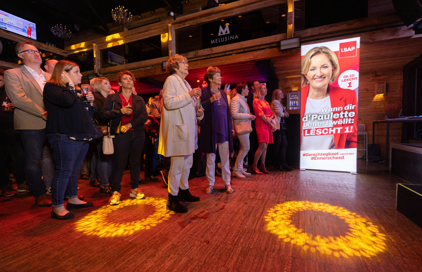 LSAP supporters are seen at the party’s election night headquarters, at Melusina, 8 October 2023. Photo: Guy Wolff/Maison Moderne