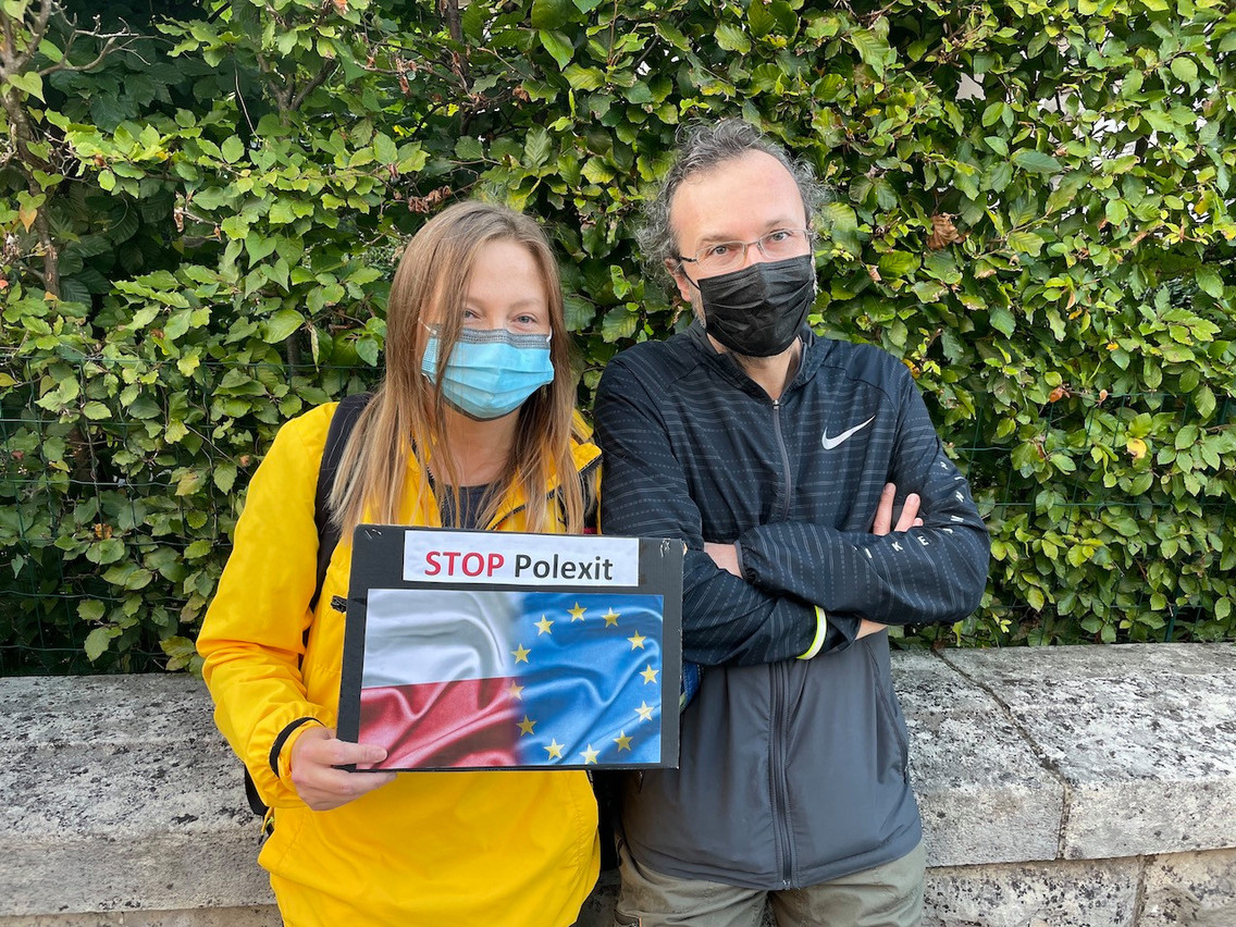 Agnieszka and Janusz at the protest on Sunday. They say many Poles don’t see the link between the court ruling and a possible Polexit Maison Moderne