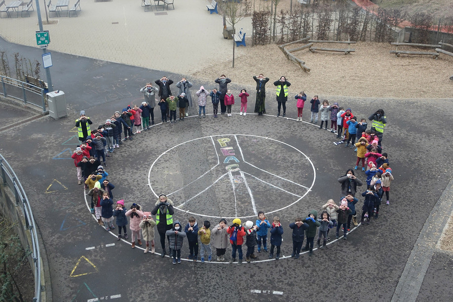 Pupils at ISL formed a peace sign as part of school activities to address the war in Ukraine                      Photo: International School of Luxembourg