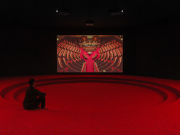 Angelica Mesiti, Assembly, 2019 (production still) three-channel video installation in architectural amphitheater. HD video projections, colour, six-channel mono sound, 25 min, dimensions variable. ((Photo: Josh Raymond))