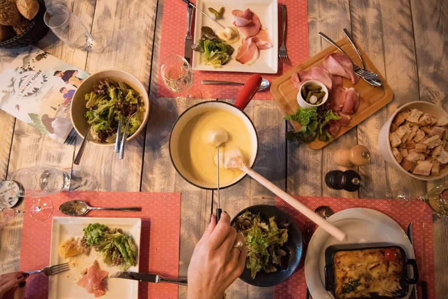 At Le Mont Dorf, French or Swiss raclette and Savoyard fondue are washed down with a shot of kirsch. (Photo: Le Mont Dorf)