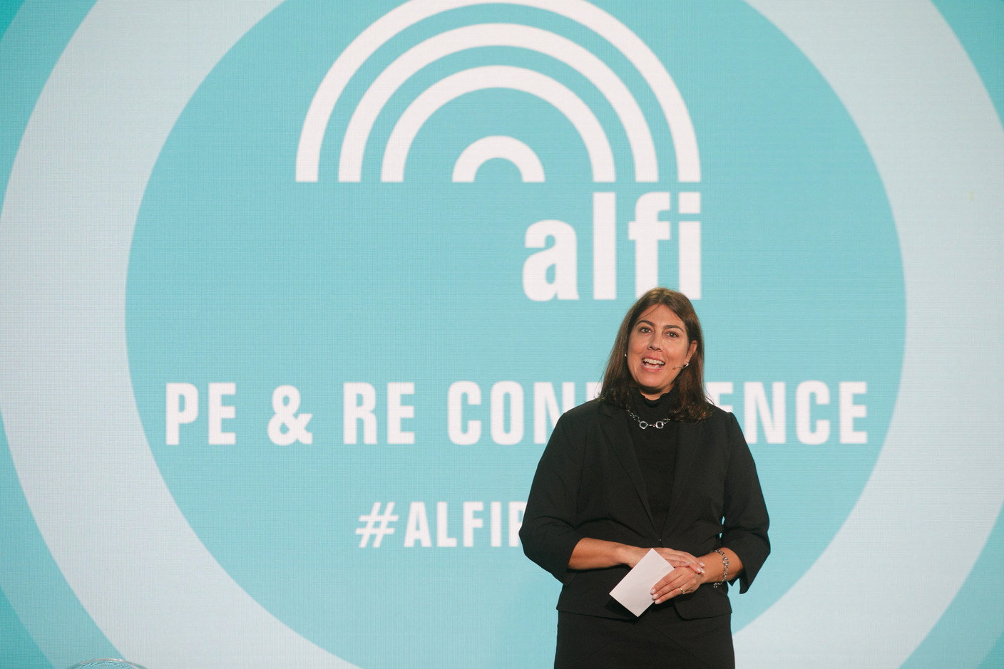Lize Griffiths, partner at Deloitte and conference day two chairperson, is seen speaking at Alfi’s PE & RE conference, 1 December 2021. Photo: Matic Zorman