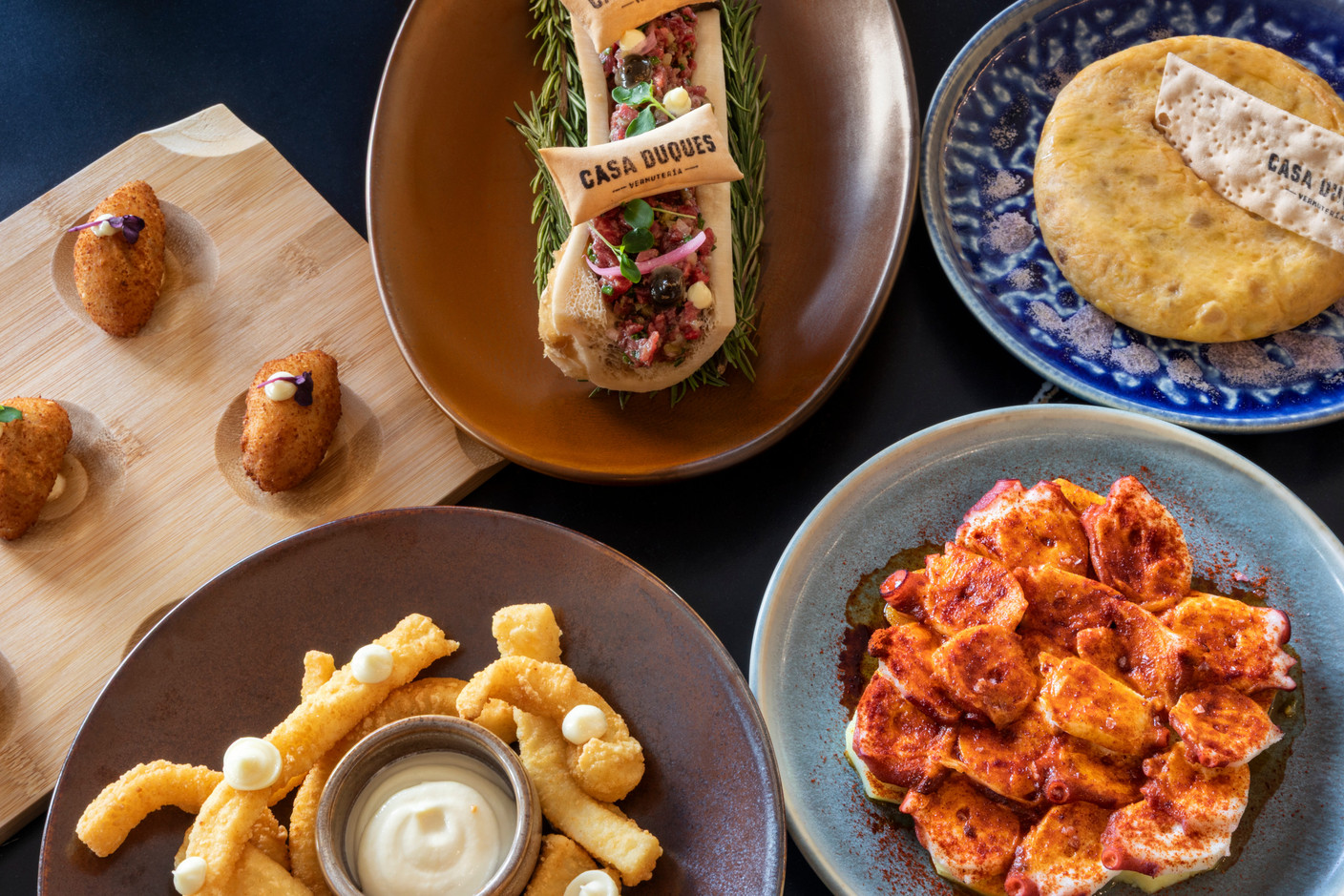At Casa Duques, the hot antipasti smell just like Spain. (Photo: Casa Duques)