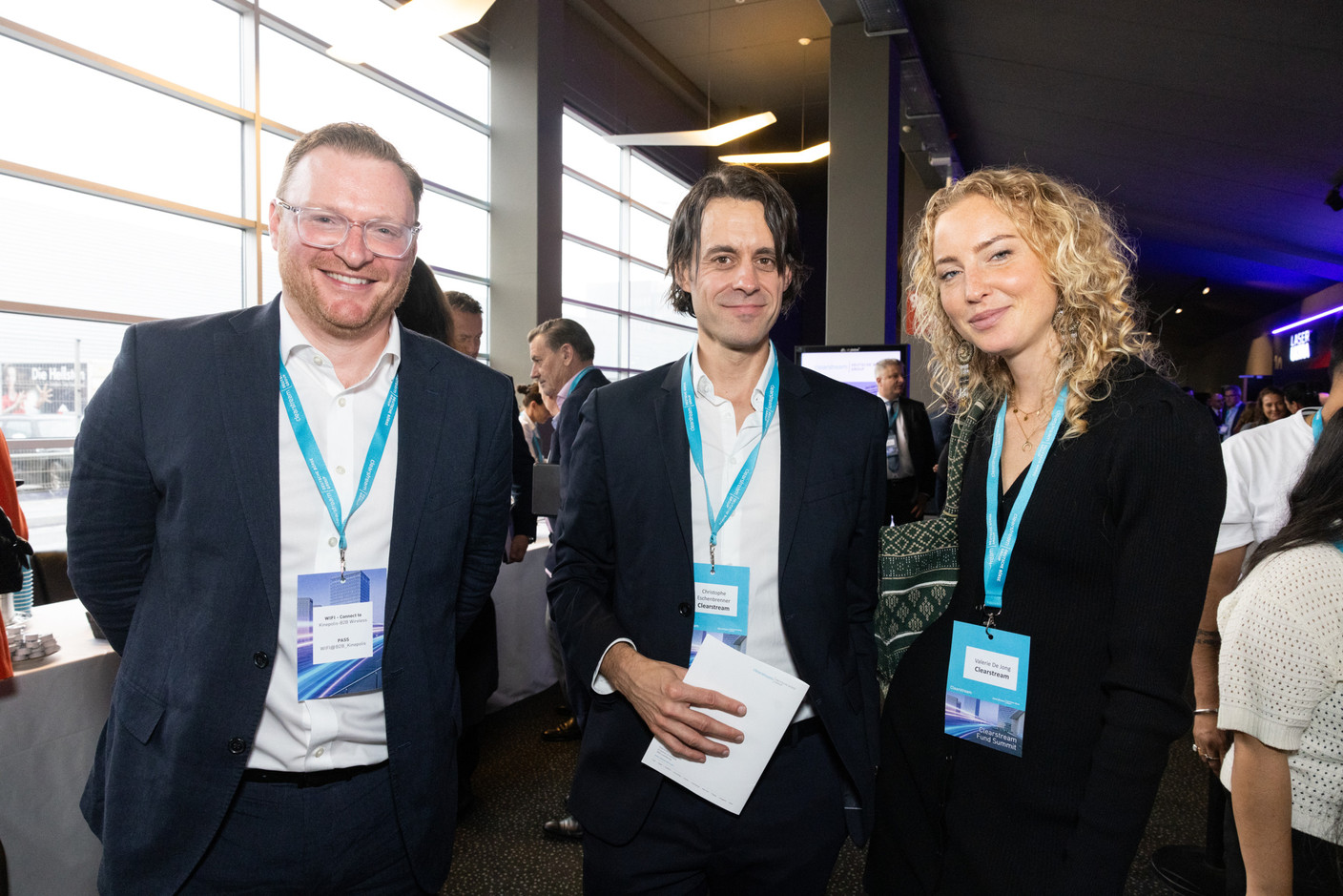 Luke Attfield (Clearstream), Christophe Eschenbrenner (Clearstream) and Valerie De Jong (Clearstream) at the Clearstream Fund Summit, Kirchberg Kinepolis, 10 October 2024. Photo: Eva Krins/Maison Moderne