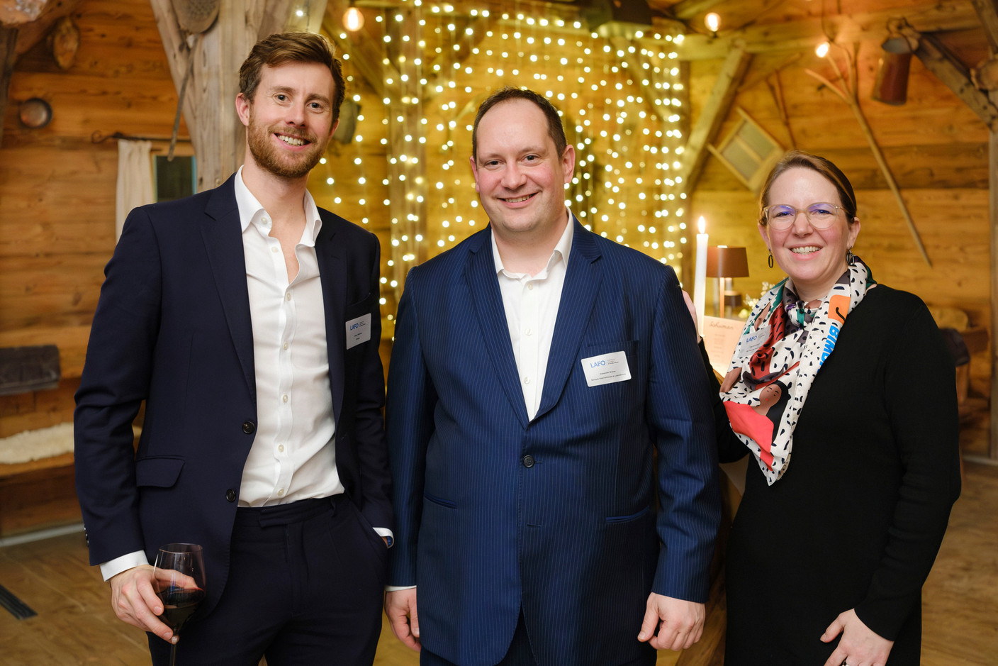 Adam Watkins (Cinven), Alexander Bräuer (Banque Internationale à Luxembourg) et Martina Frisch (BIL Manage Invest) au cocktail d'hiver de Lafo à la Brasserie Schuman, le 11 février 2025. (Photo: Pancake! Photographie)