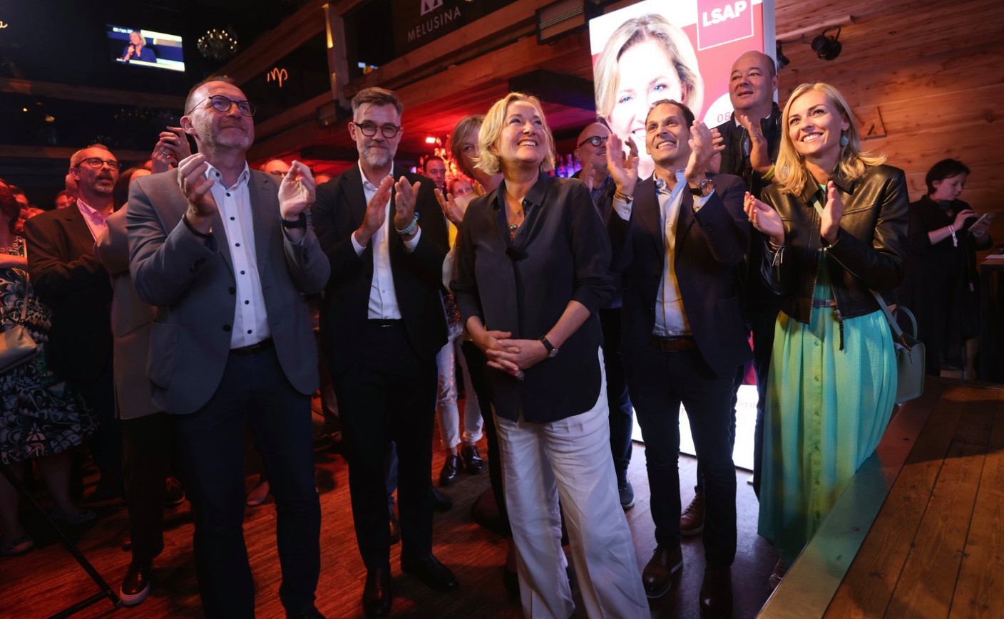 At the LSAP’s election night headquarters at Melusina. From left to right: Georges Engel, Franz Fayot, Paulette Lenert, Dan Biancalana, Claude Haagen and Taina Bofferding. Photo: Guy Wolff/Maison Moderne