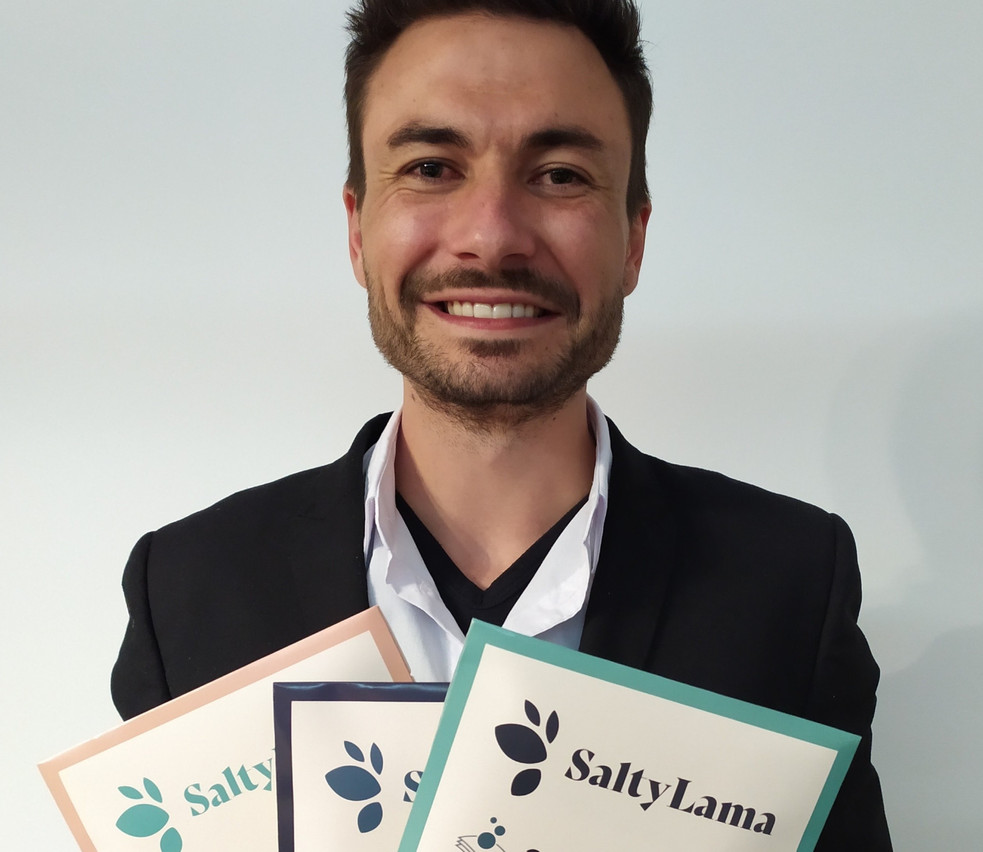SaltyLama CEO Ben Smith with three samples of the eco-friendly laundry stripes SaltyLama 