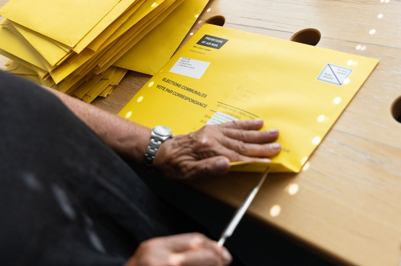 Postal ballots are seen being sorted by election staff in Esch-sur-Alzette, 11 June 2023. Photo: Guy Wolff/Maison Moderne