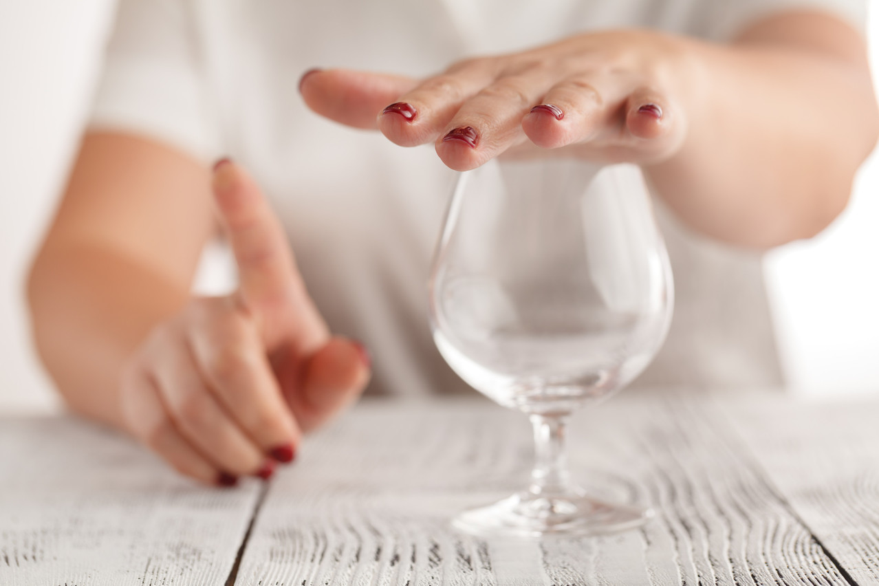 Though alcohol is a handy crutch during social situations, consuming too much on a regular basis can lead to health complications. Photo: Shutterstock