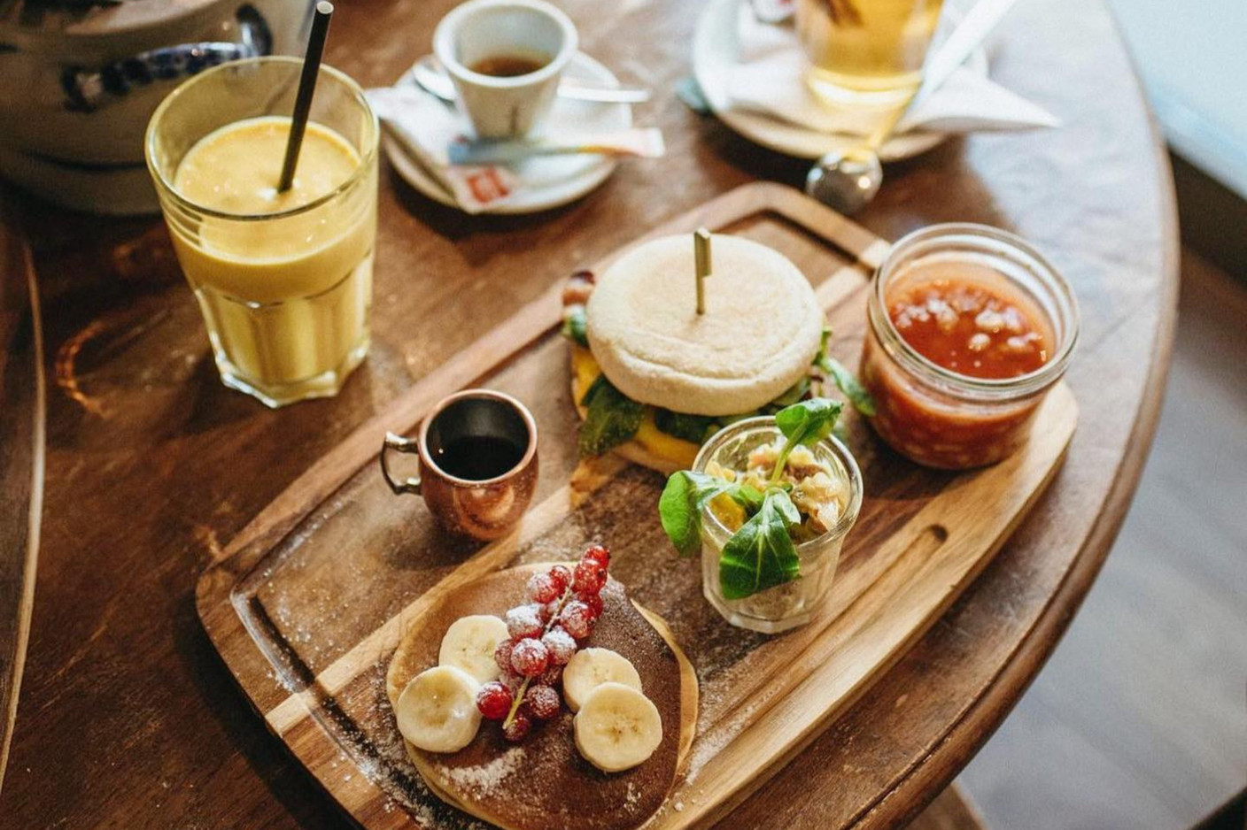 Brunch is served on a wooden cutting board Photo: Charles Sandwiches