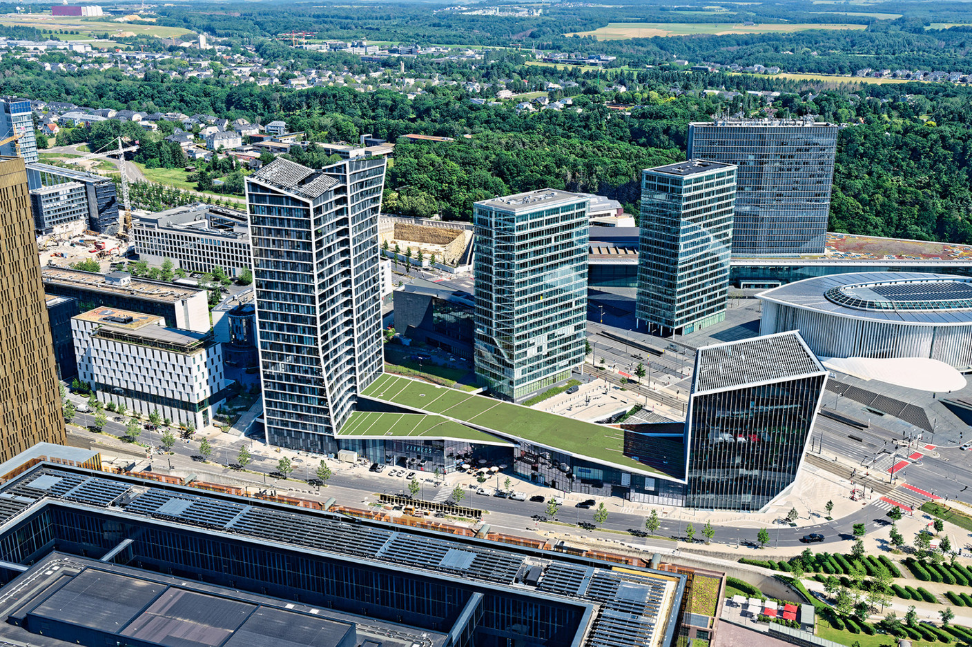 The Infinity project comprises a shopping centre, two residential towers and an office building. Photo: Immobel