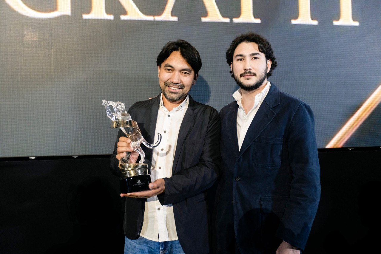The Snow Leopard Panavision Award for Best Cinematography, along with a $45,000 Panavision Camera Package Grant, was awarded to cinematographer Zhanrbek Yeleubek for Kazakhstan coming of age drama Bauryna Salu, and accepted by the film's director Askhat Kuchinchirekov and producer Dias Feld at the Asian World Film Festival closing night at the Culver Theater on 21 November 2024 in Culver City, California.   Photo: Greg Doherty 2024/Getty Images for Asian World Film Festival