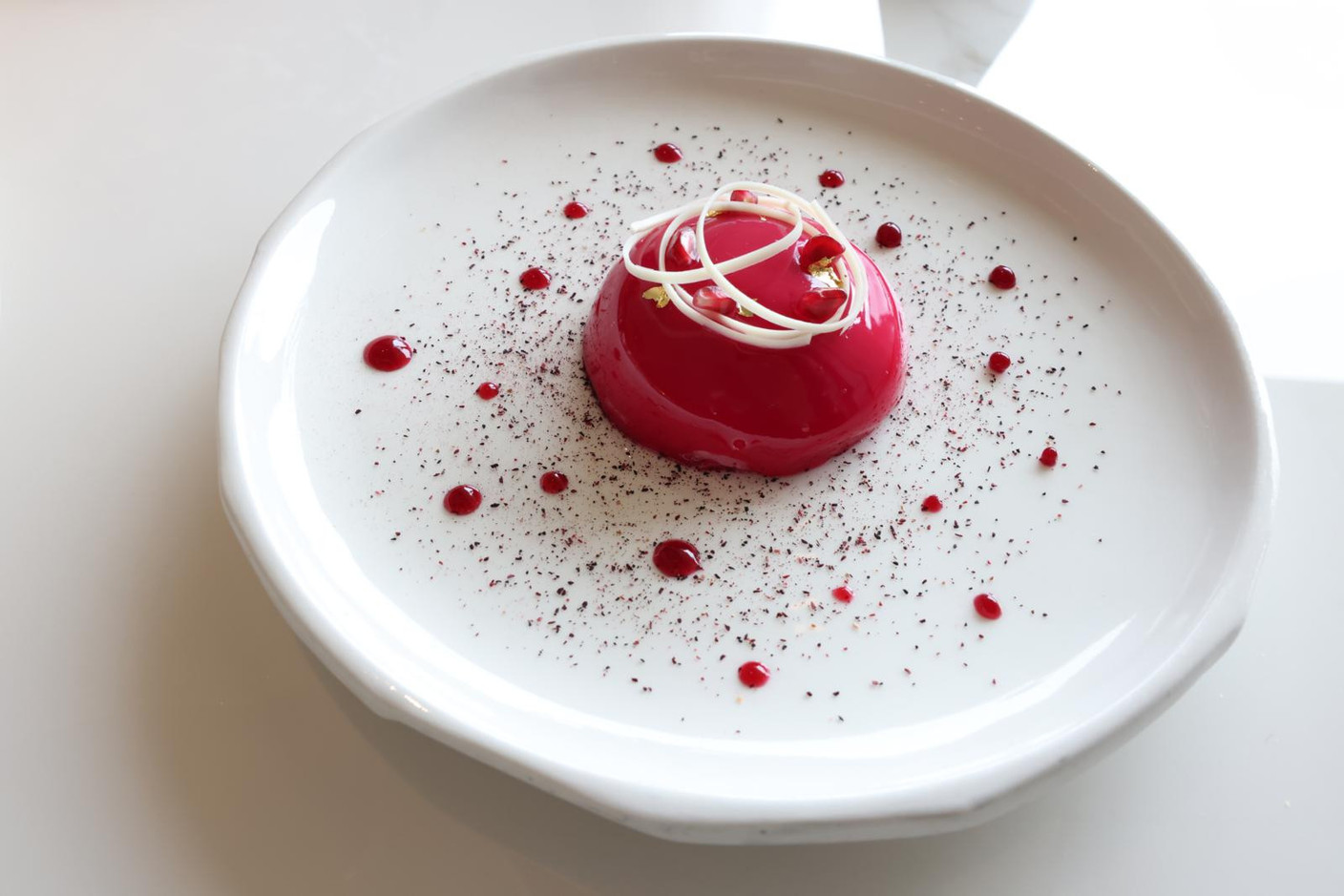 The lightness and freshness of pomegranate entremet Photo credit: Marie Russillo (Maison Moderne)