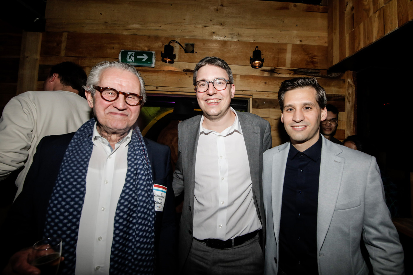 Sven Clement (Pirate Party MP), centre; Jerry Weyer (Taxx.lu), on right; seen during Delano’s 12th anniversary party, 23 February 2023. Photo: Marie Russillo/Maison Moderne