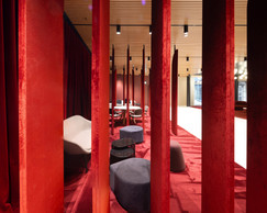 Small lounges have been set up in the side sections of the lobby. Photo: Guy Wolff/Maison Moderne