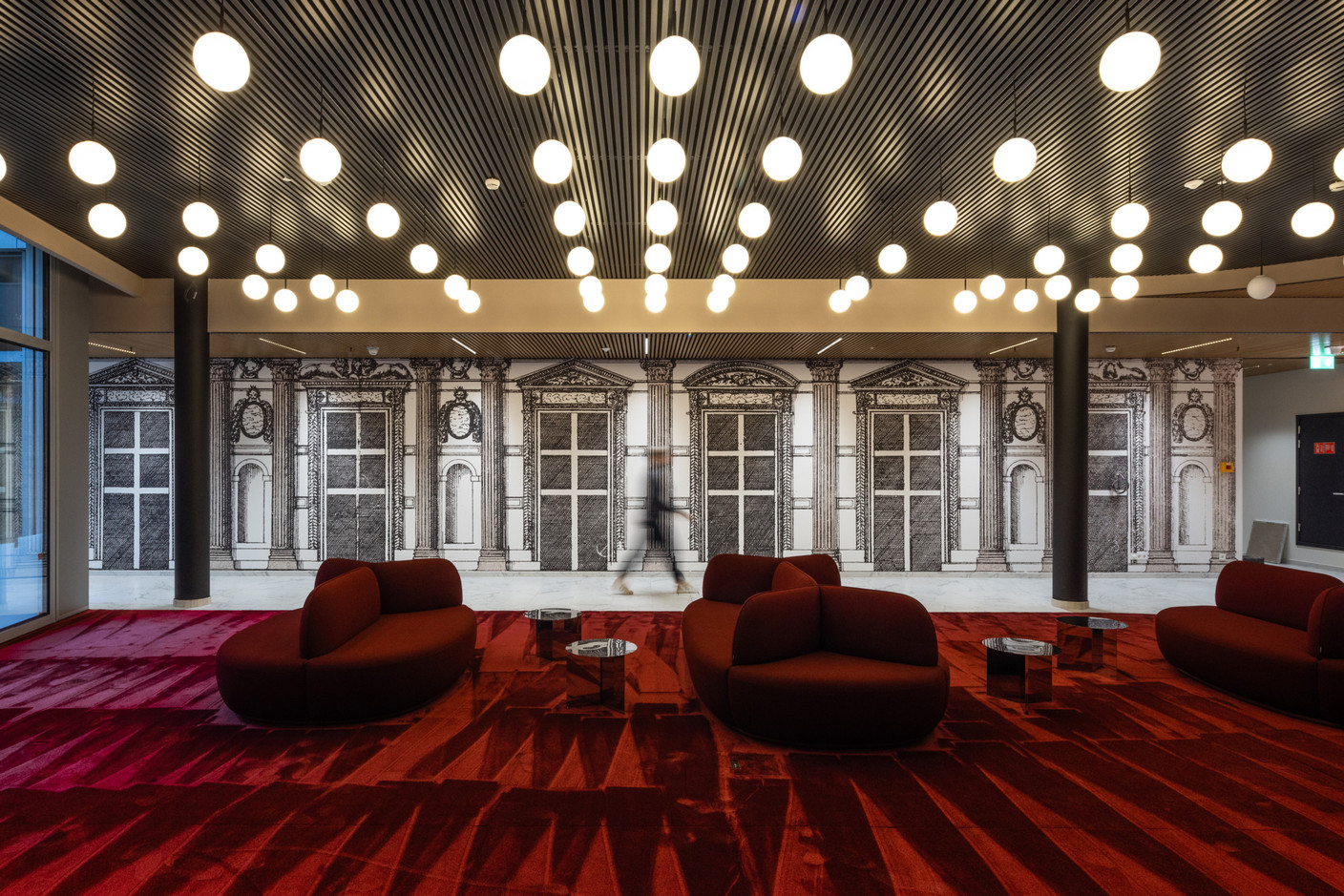 The panoramic wallpaper takes its design from the former façade of an annex of the Louvre. Photo: Guy Wolff/Maison Moderne