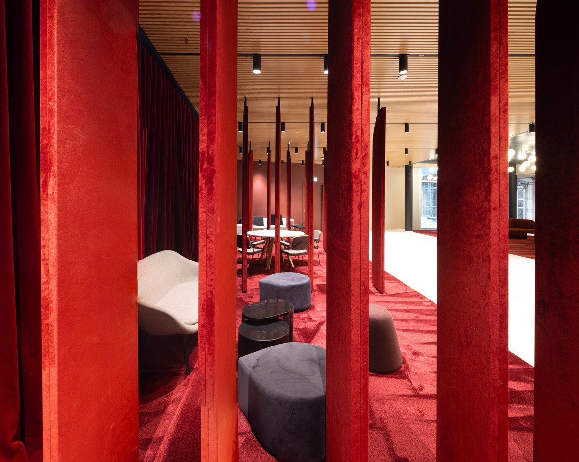 Small lounges have been set up in the side sections of the lobby. Photo: Guy Wolff/Maison Moderne
